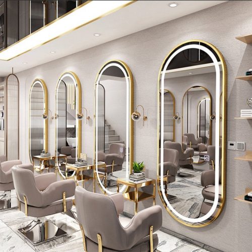 Custom high-end decorative mirror frames for beauty salons by Xinye Metal featuring premium gold and black stainless steel finishes for salon stations, styling areas, and luxury beauty interior design projects