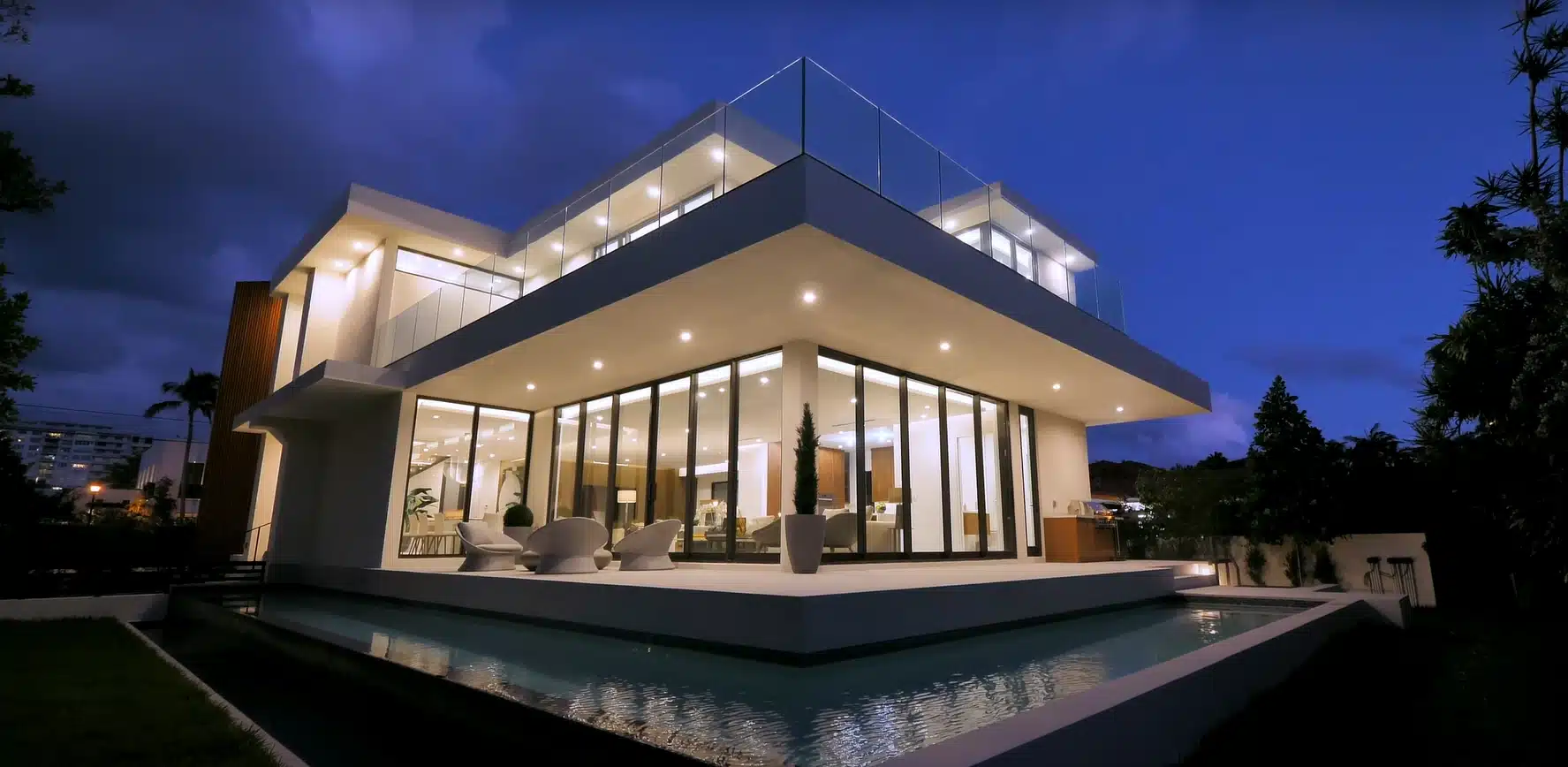 Bespoke stainless steel glass railings for luxury villas by Xinye Metal featuring premium gold and black stainless steel frames with tempered glass panels for terraces, staircases, balconies, and pool surrounds in high-end residential properties
