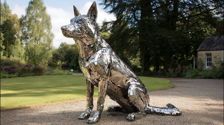 Custom stainless steel dog statue with mirror finish for public park installation