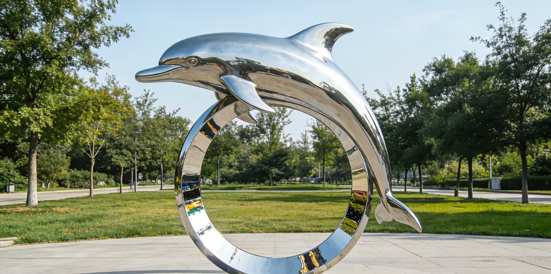 Abstract polished stainless steel dolphin sculpture for outdoor decor