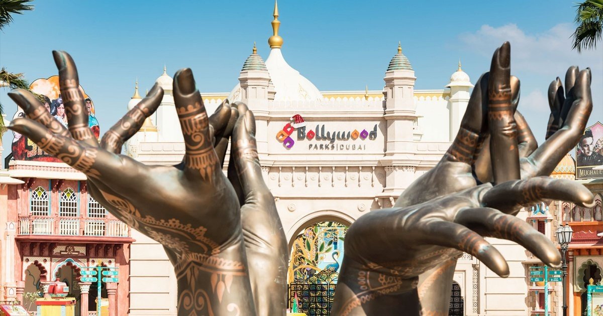 Detailed view of a stainless steel exoskeleton on a landmark UAE building constructed by specialist steel engineering firms.