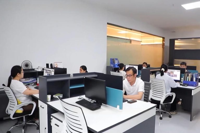 High-tech office environment at XinYe Metal with sleek furniture and advanced equipment.