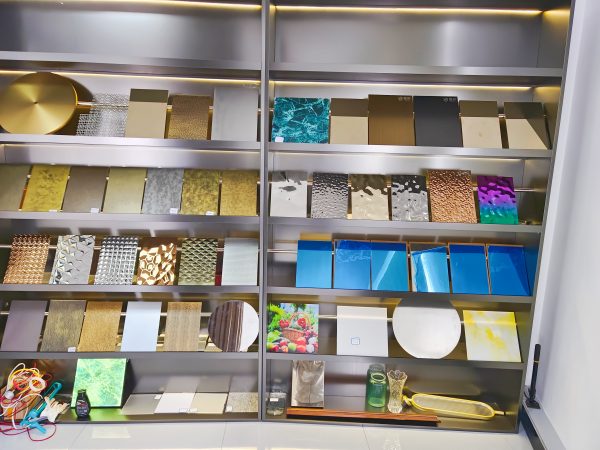 XinYe Metal decorative stainless steel sample library displaying various finishes and patterns.