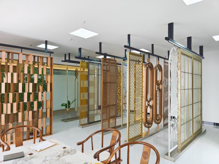XinYe Metal stainless steel partition screens with polished finishes on display in the showroom.