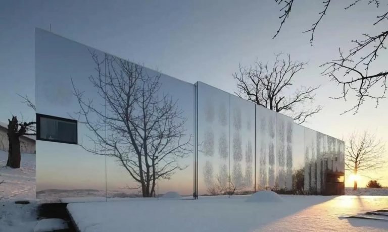 Textured stainless steel exterior panels with unique pattern