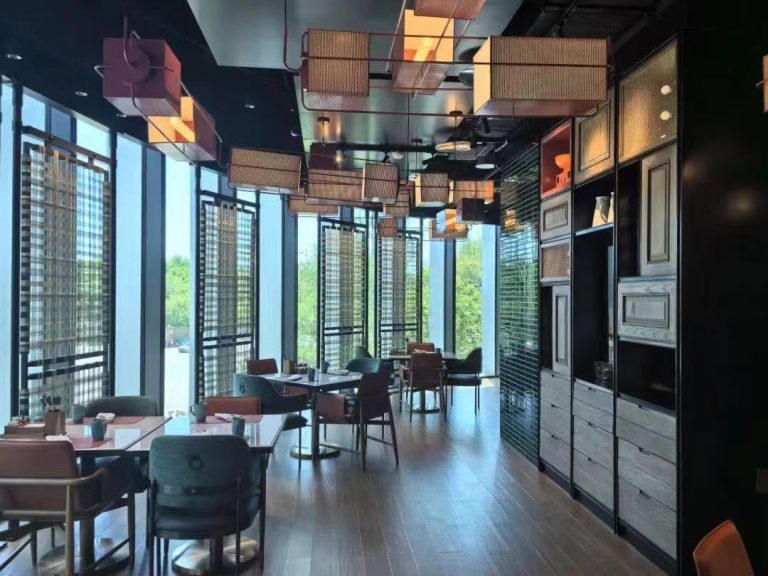XinYe Metal custom stainless steel screen designed and installed for an upscale luxury restaurant interior