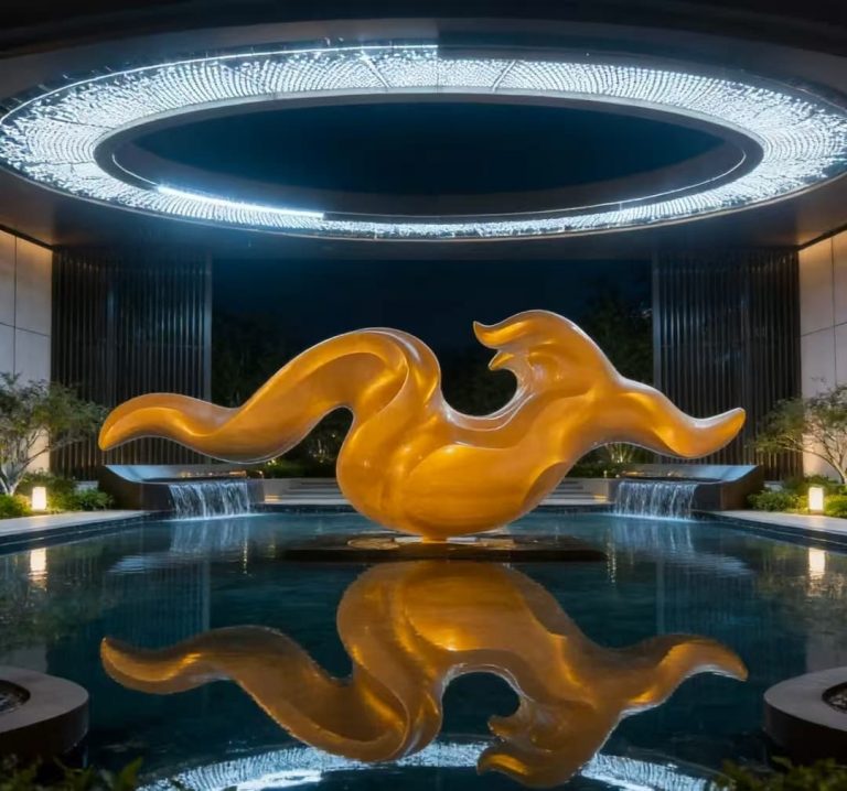 Artistic stainless steel fountain with flowing water, ideal for commercial landscape design