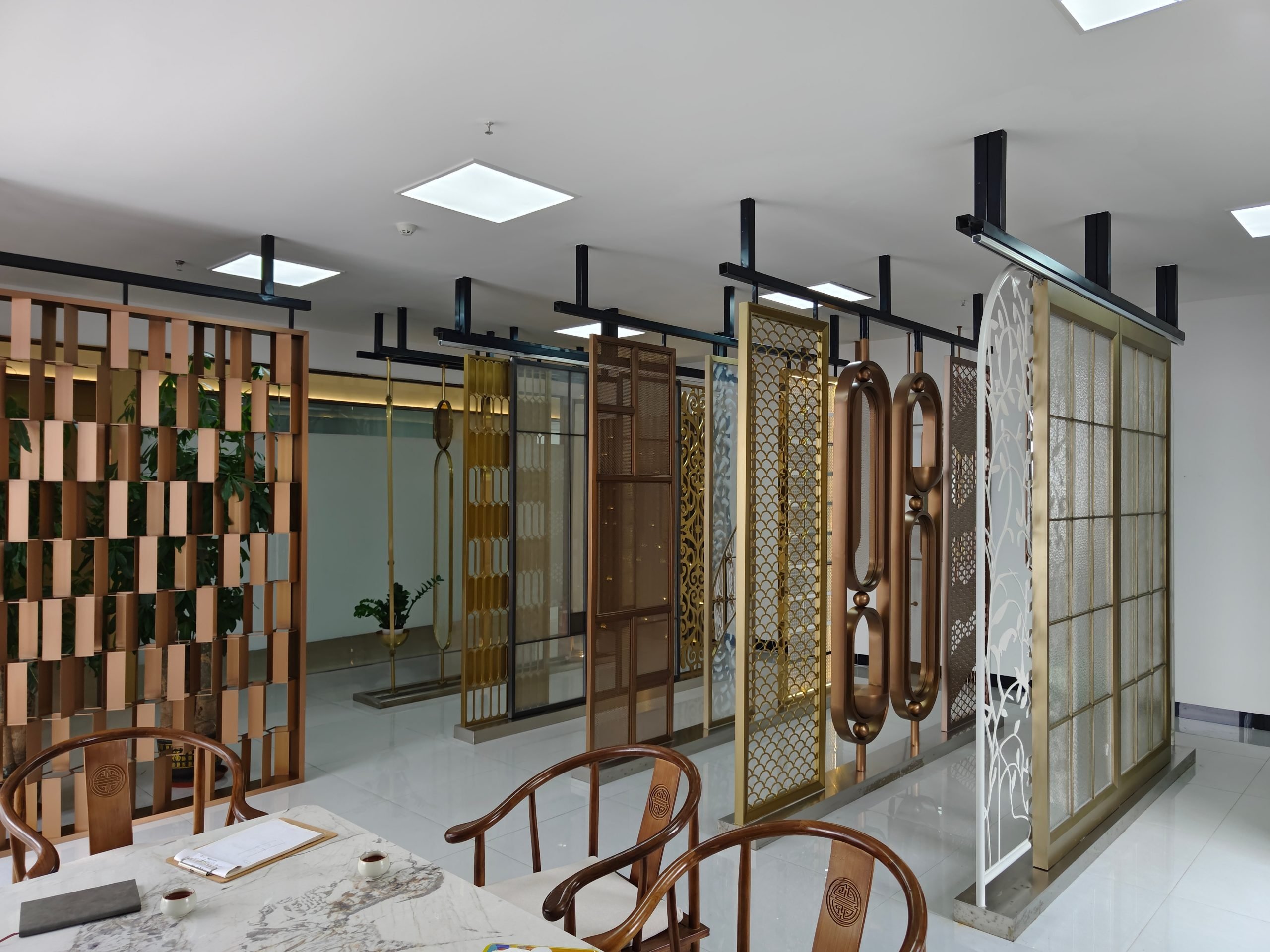 Color-coated stainless steel decorative screen display by XinYe Metal, featuring elegant finish for interior partition and wall decor.