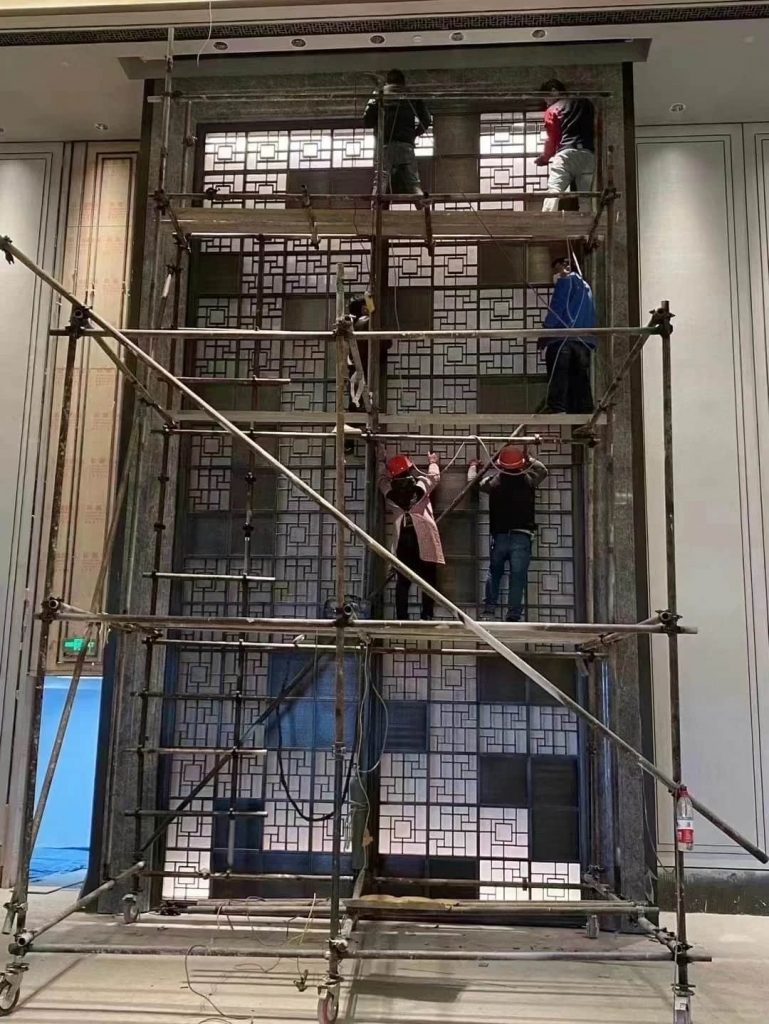 installation of stainless steel partition wall base and posts by XinYe Metal