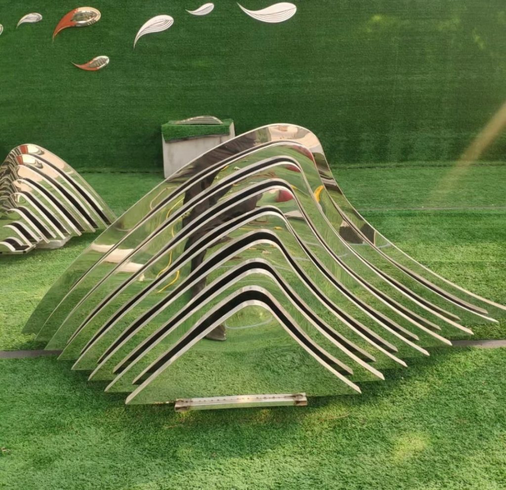The Little Golden Mountain stainless steel sculpture customized by Xinye Metal for the sales office.