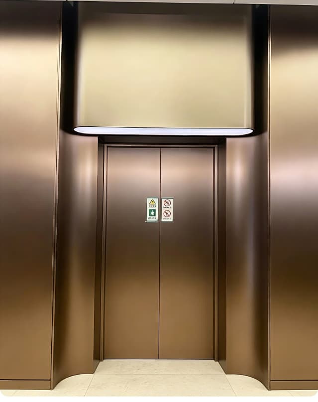 Custom elevator metal decorative panels supplied by XinYe Metal for Dubai client.