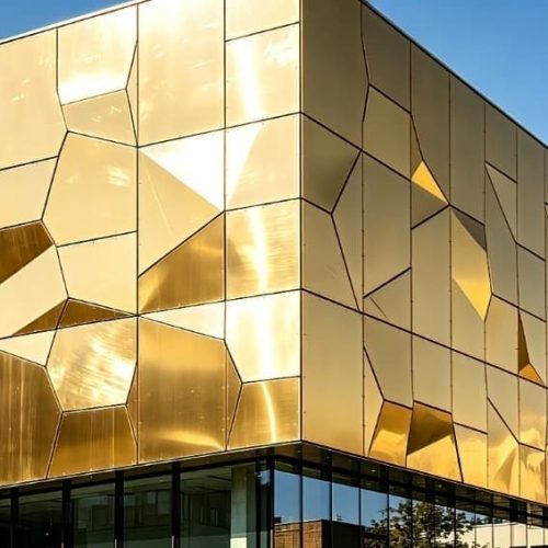 Gold PVD stainless steel curtain wall panels by XinYe Metal, luxurious architectural facade.