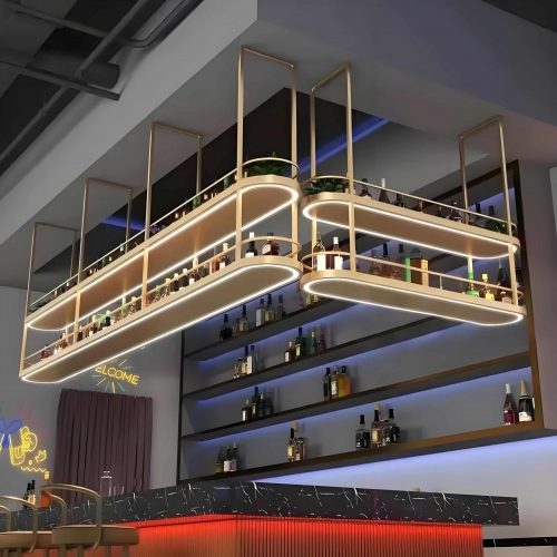 Custom gold stainless steel decorative hanging cabinet with sleek floating design, mirrored or brushed finish, and ambient backlighting, installed in a premium nightclub lounge interior.