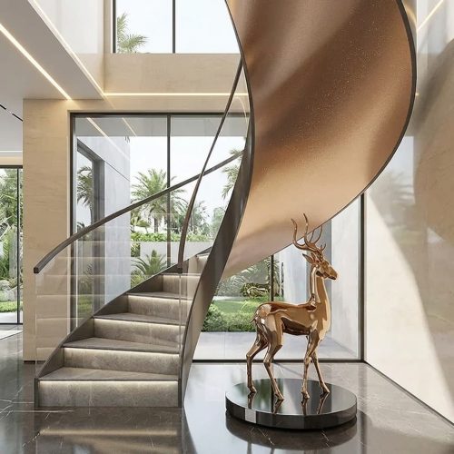 Contemporary custom staircase featuring transparent tempered glass balustrades, sleek stainless steel handrails, and floating treads, set in a bright modern villa interior.