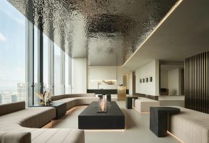 Luxury mansion interior with an artistic ceiling crafted from water ripple stainless steel panels, flowing wave textures, dramatic light-and-shadow interplay, and opulent metallic finish.