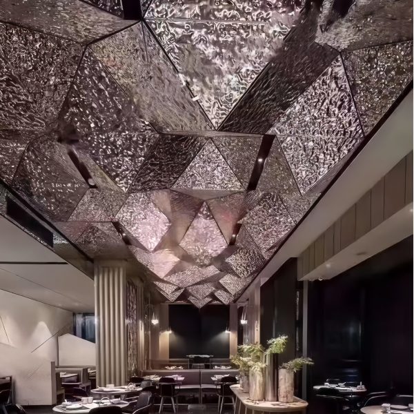 Custom rose gold metal ceiling for hotel lobby by XinYe Metal, luxurious warm finish.
