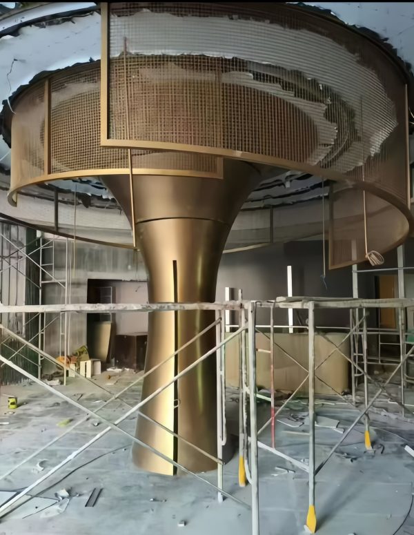 Installation site of gold mushroom-shaped metal column in Dubai by XinYe Metal.