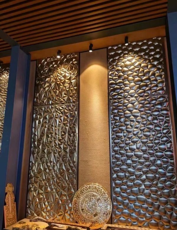 Artistic stainless steel curtain wall crafted by XinYe Metal, decorative architectural facade.