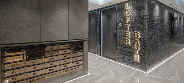 Laser-cut brushed stainless steel custom sign
