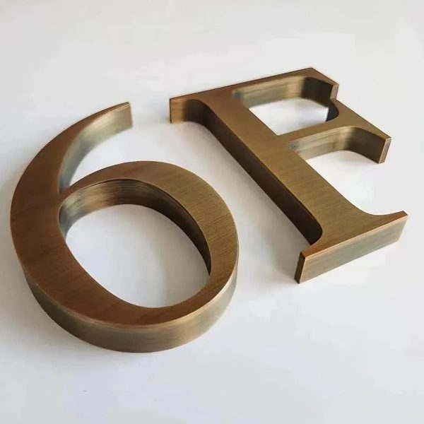 Stainless steel sign with custom logo cutout