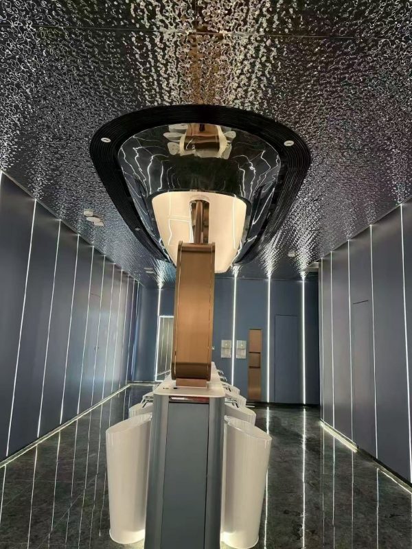 XinYe Metal’s custom water ripple metal ceiling brings a flowing, elegant design to a shopping mall restroom.