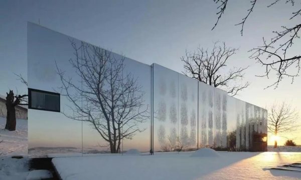 Textured stainless steel exterior panels with unique pattern