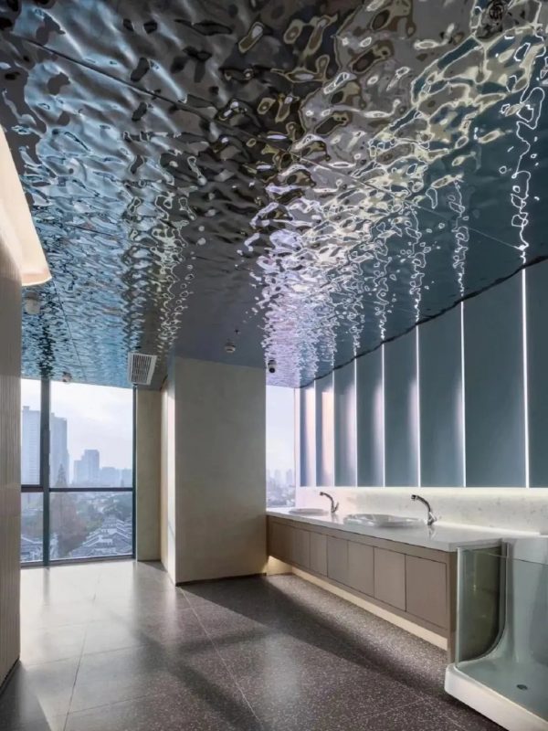 Elegant ripple patterned metal sheet ideal for feature walls and elevator interiors