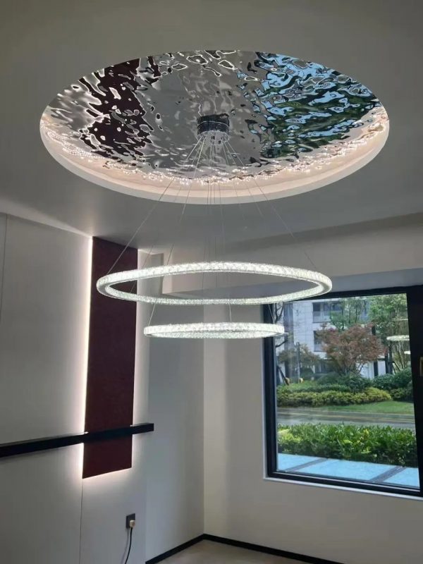 Abstract liquid metal texture – water ripple pattern on polished stainless steel